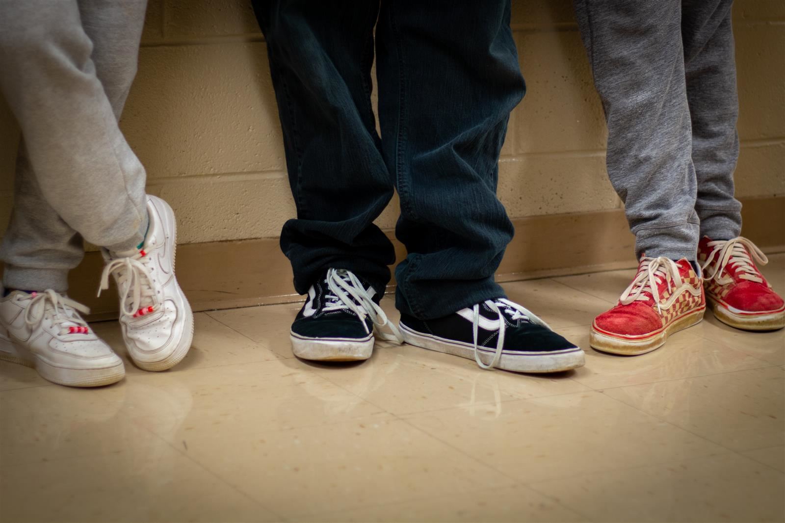 feet standing in hallway